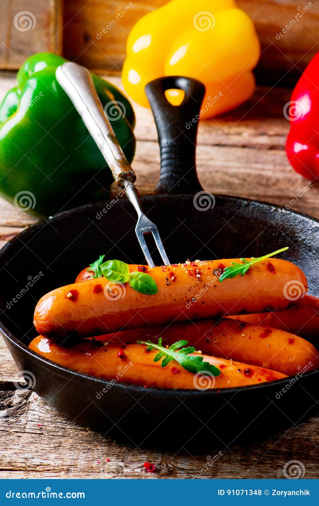 Sausages in a Pigiron Frying Pan. Stock Photo Image of grilled