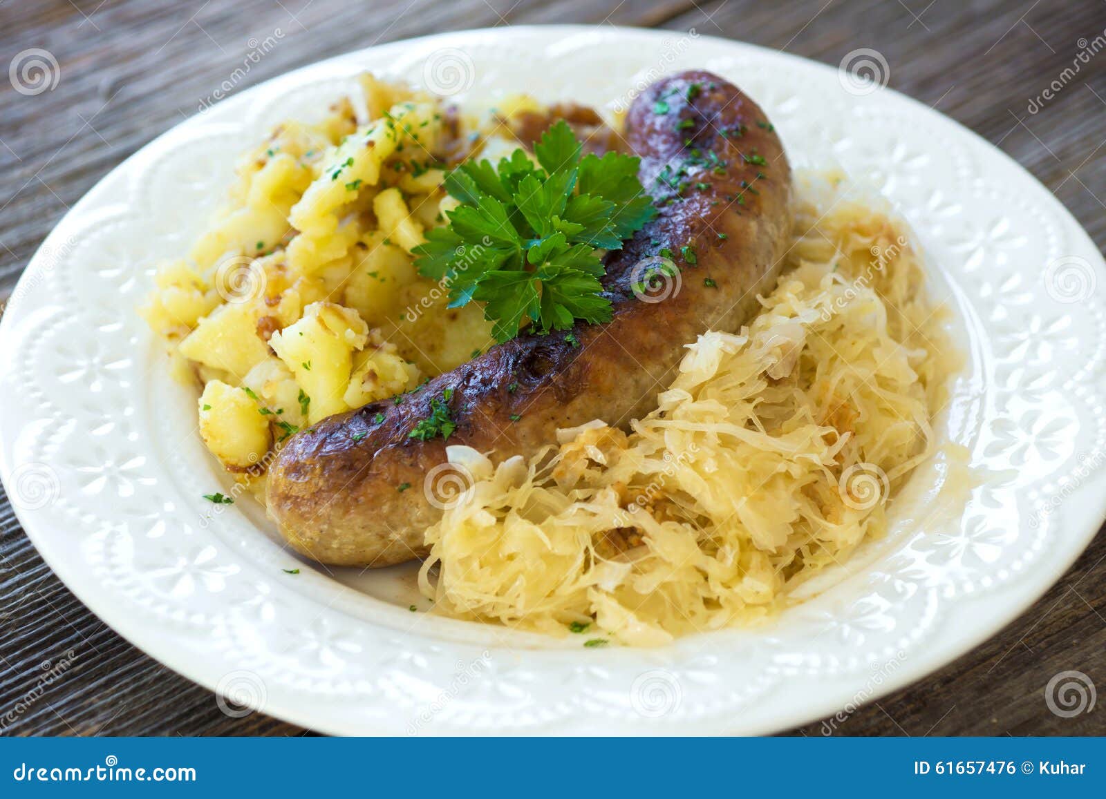 Sausages with Sauerkraut and Potatoes Stock Photo Image of cooked
