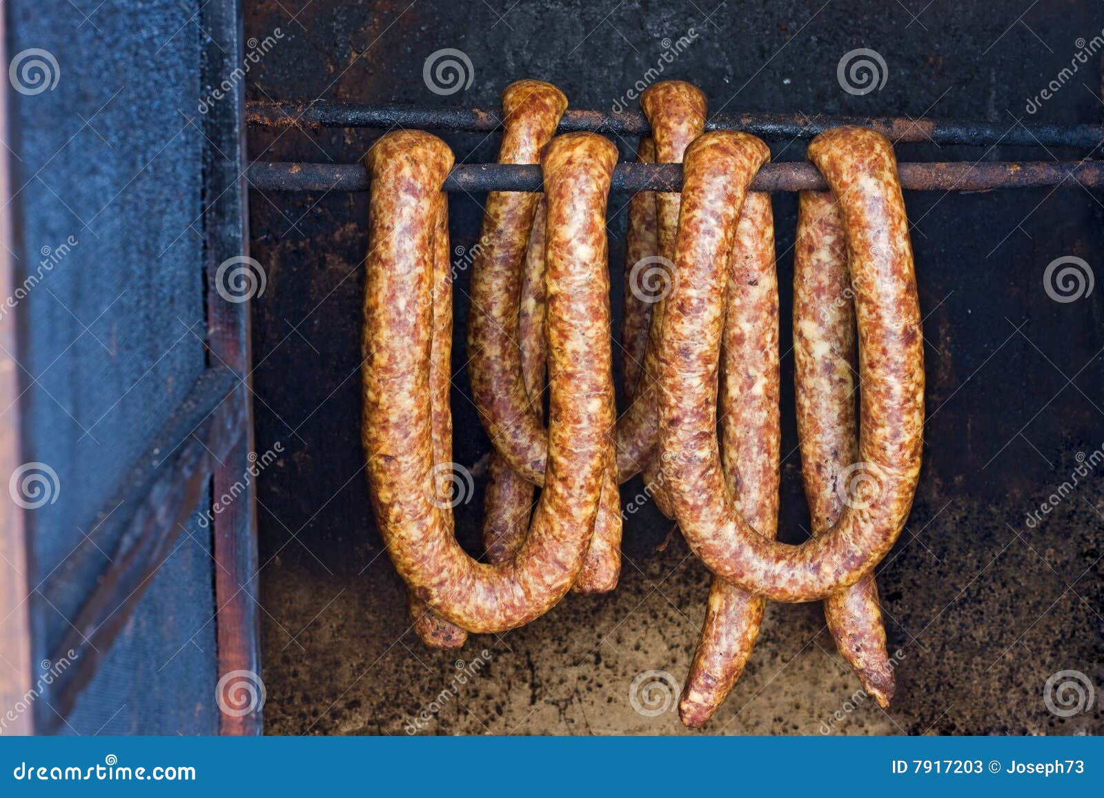 Sausages in smoke house stock image. Image of aroma, preservatives