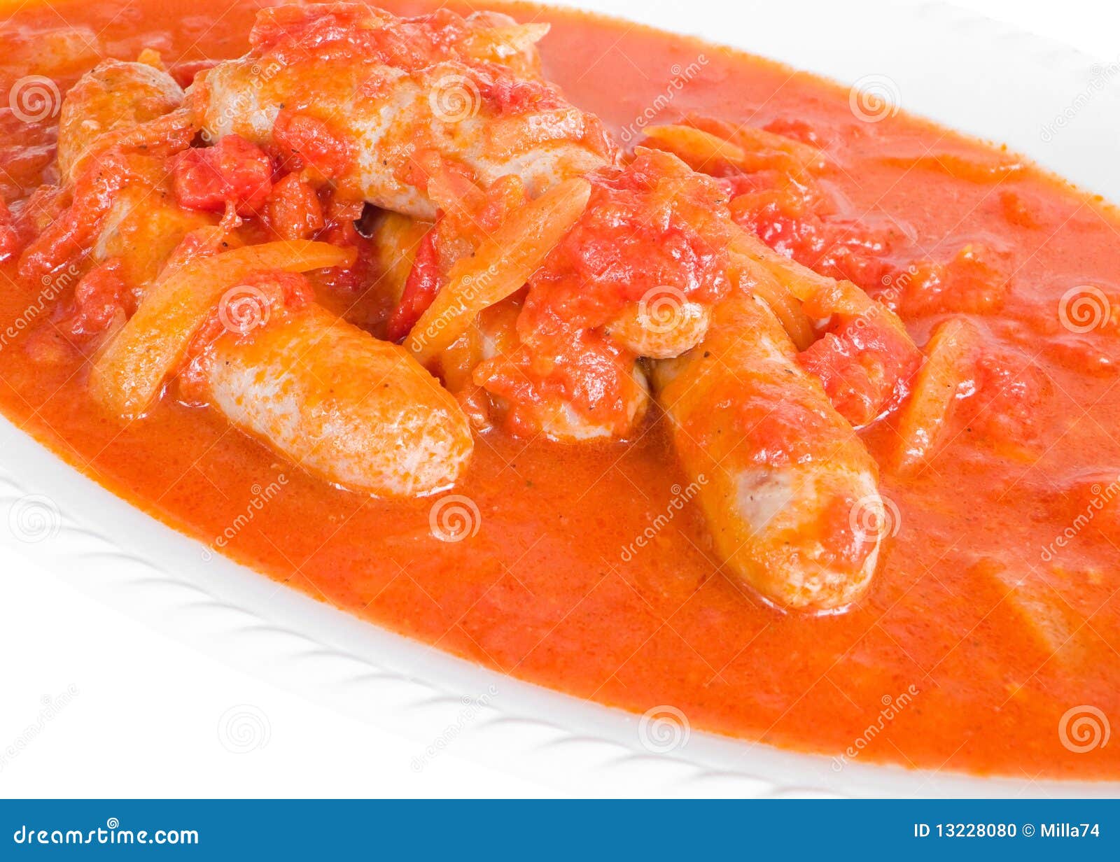 Sausages in tomato sauce. stock photo. Image of gravy 13228080
