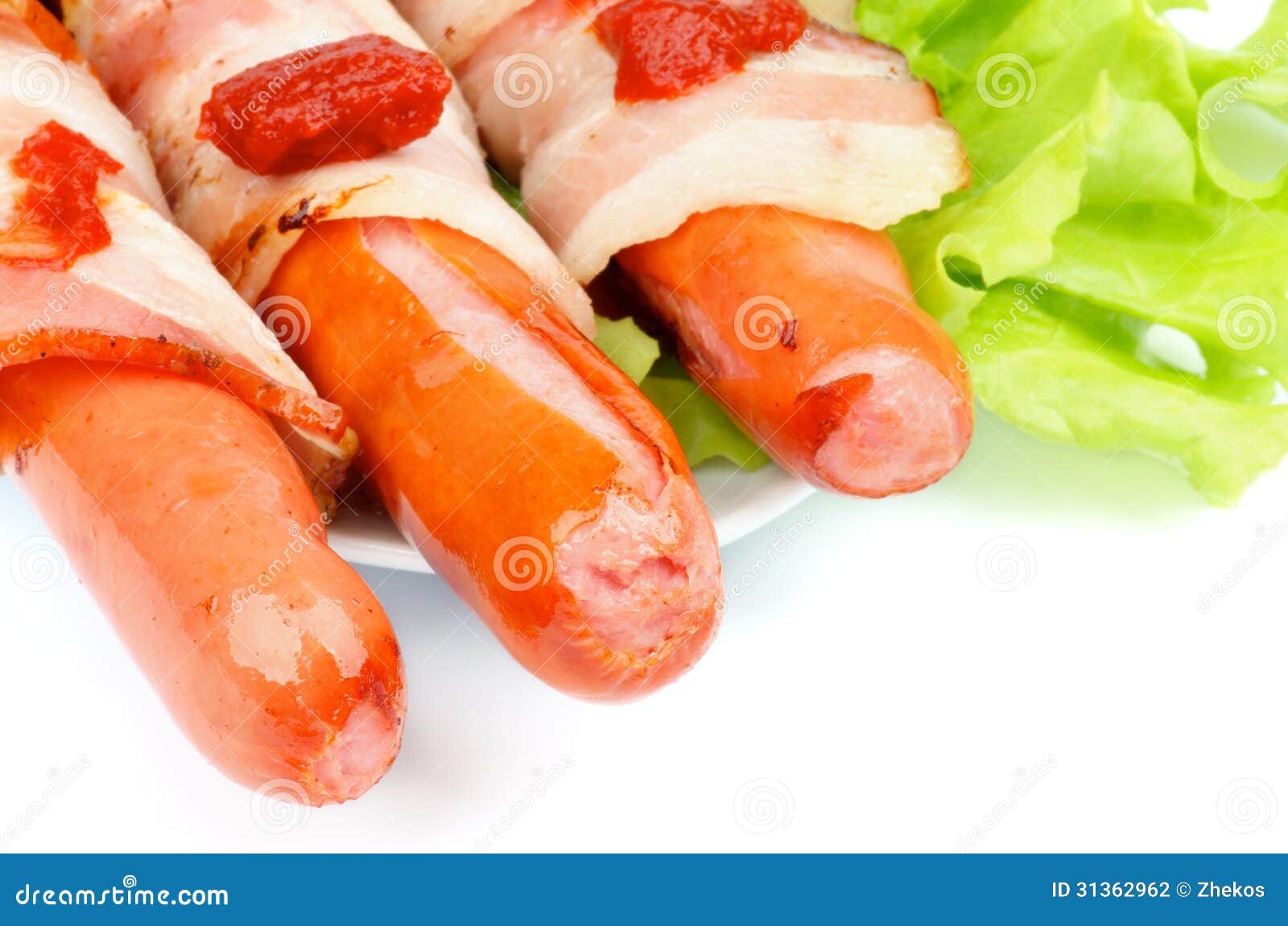 Sausages Wrapped in Bacon stock photo. Image of freshness 31362962