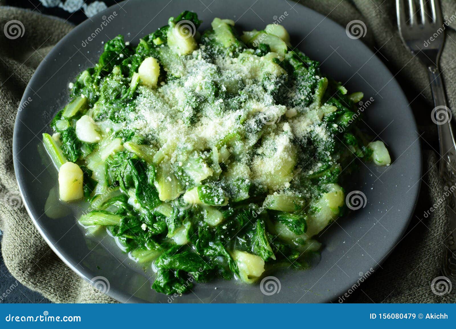 Sauteed Spinach with Potatoes, Olive Oil, Garlic and Parmesan Stock