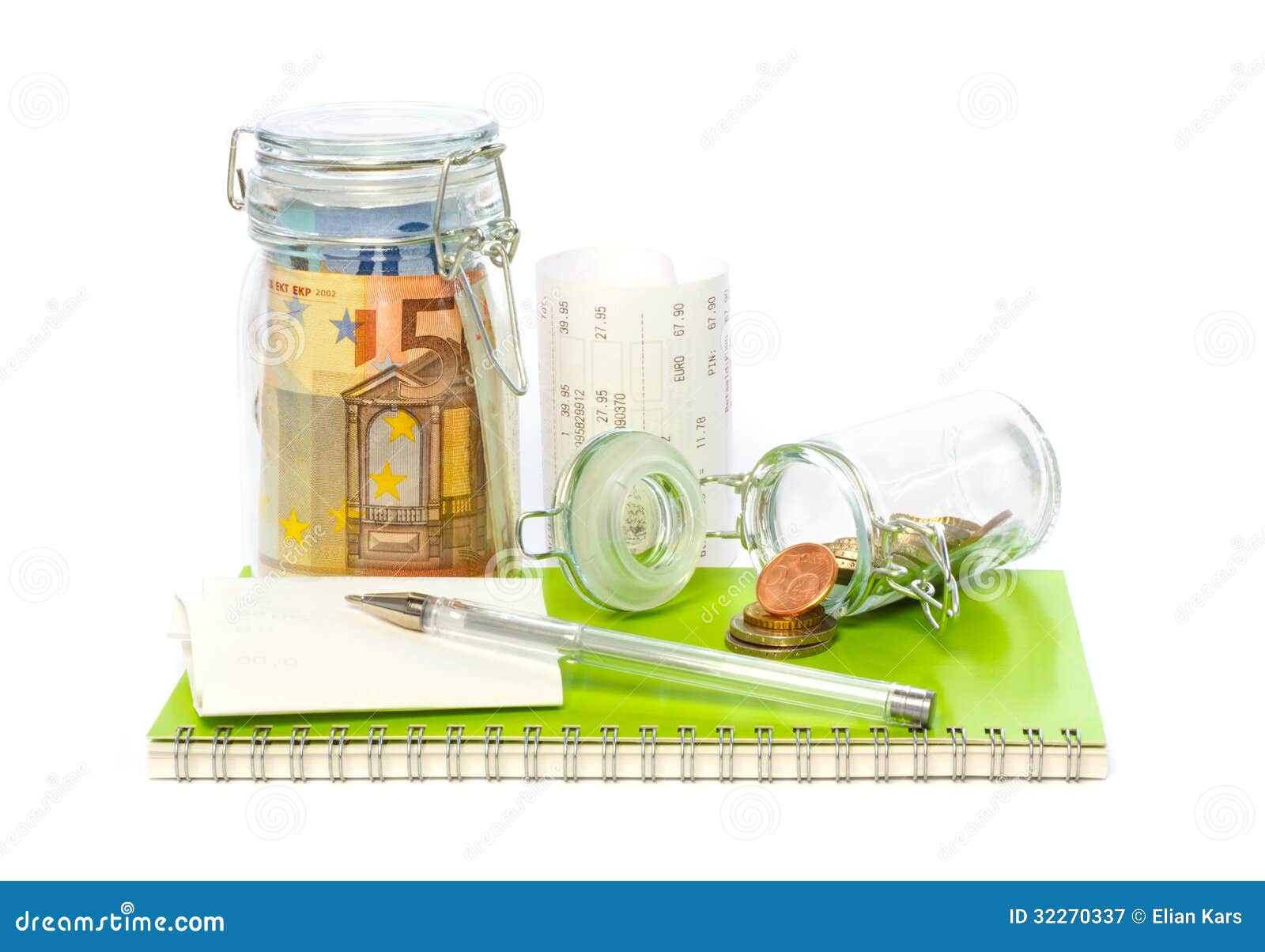 savings on the expenditure book with receipts and pen