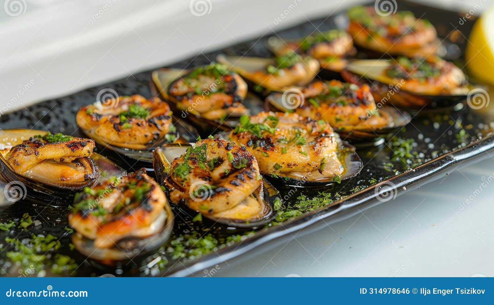 savor the taste exquisite grilled mediterranean mussels elegantly presented on a sleek black plate