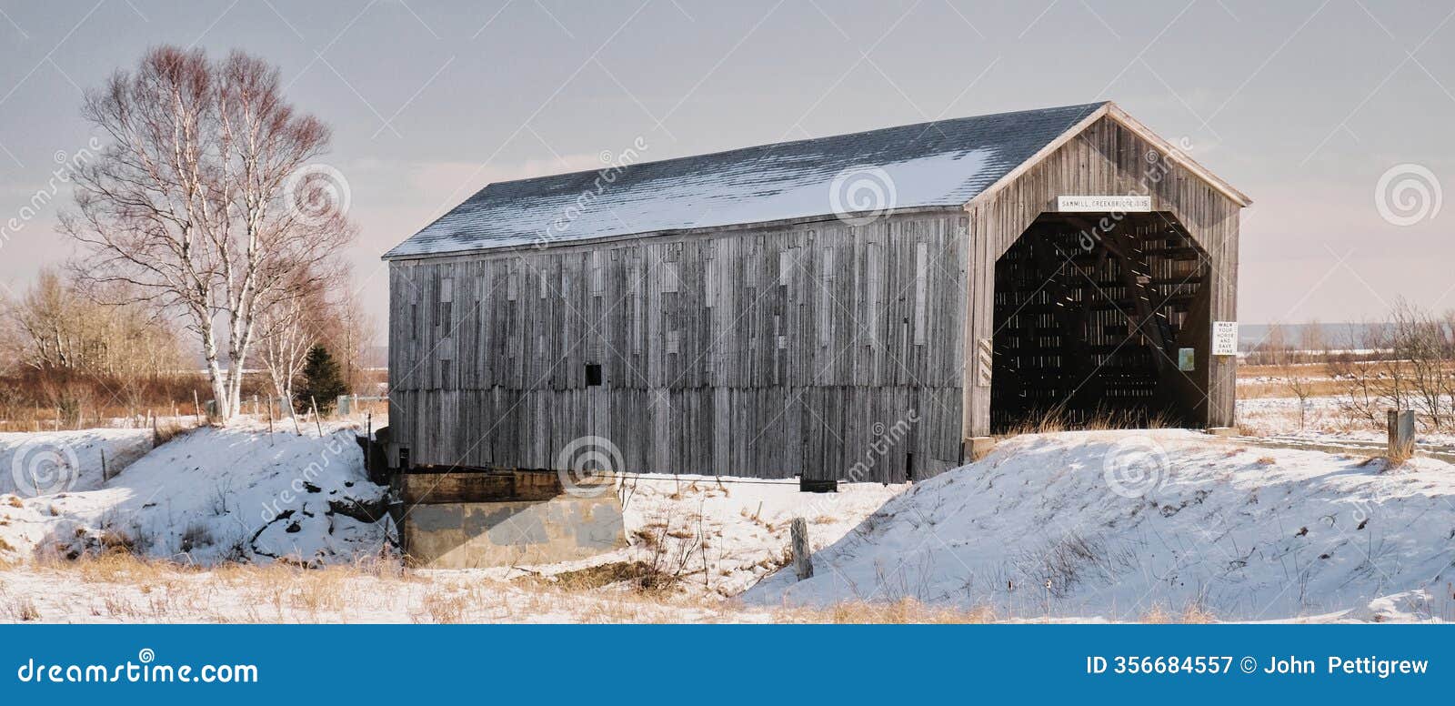 the sawmill creek covered bridge in new brunswick