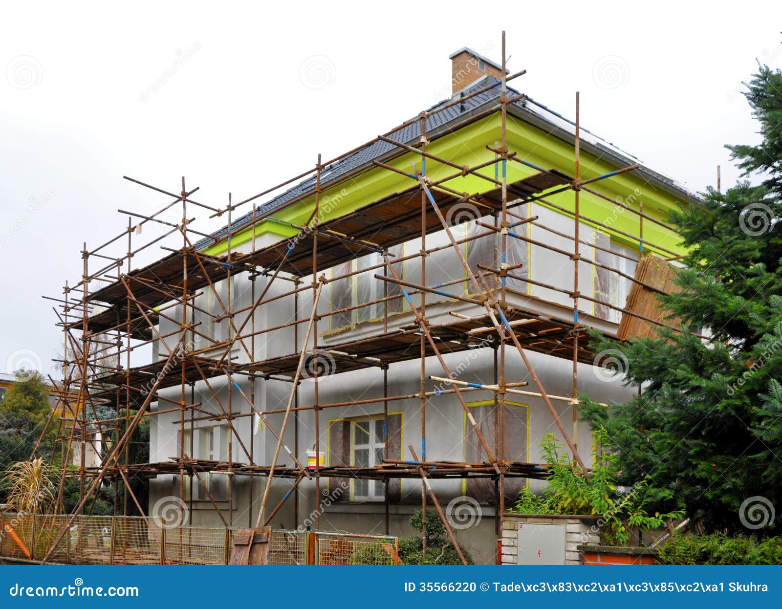 Scaffolding on the house stock photo. Image of renovation 35566220