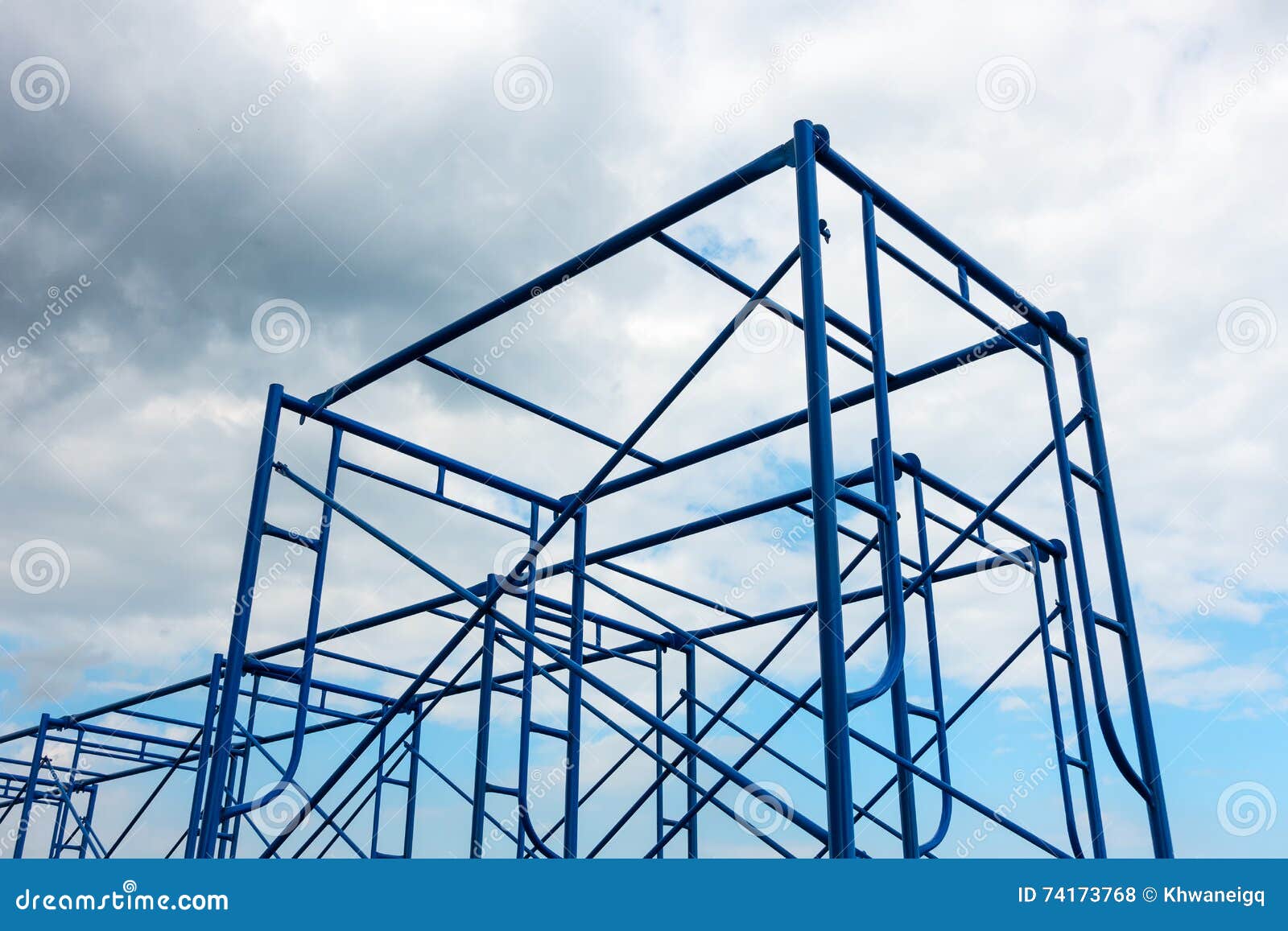 scaffolding site erection on cloudy background.