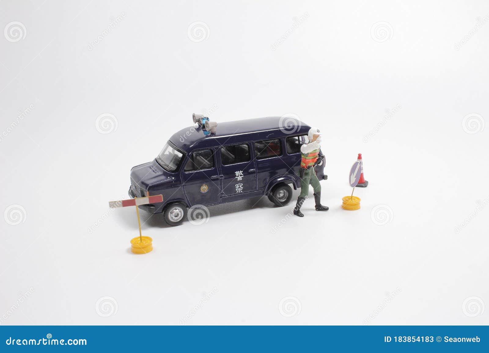 Scale Police Car Model with Figure at the White Board Stock Image