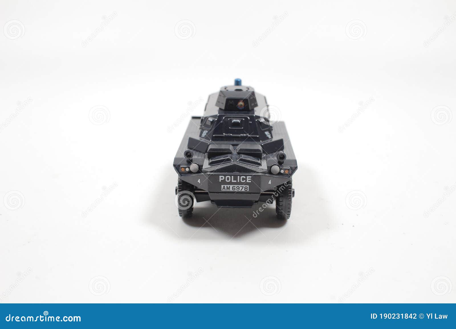 Scale Police Car Model with Figure at the White Board Stock Photo