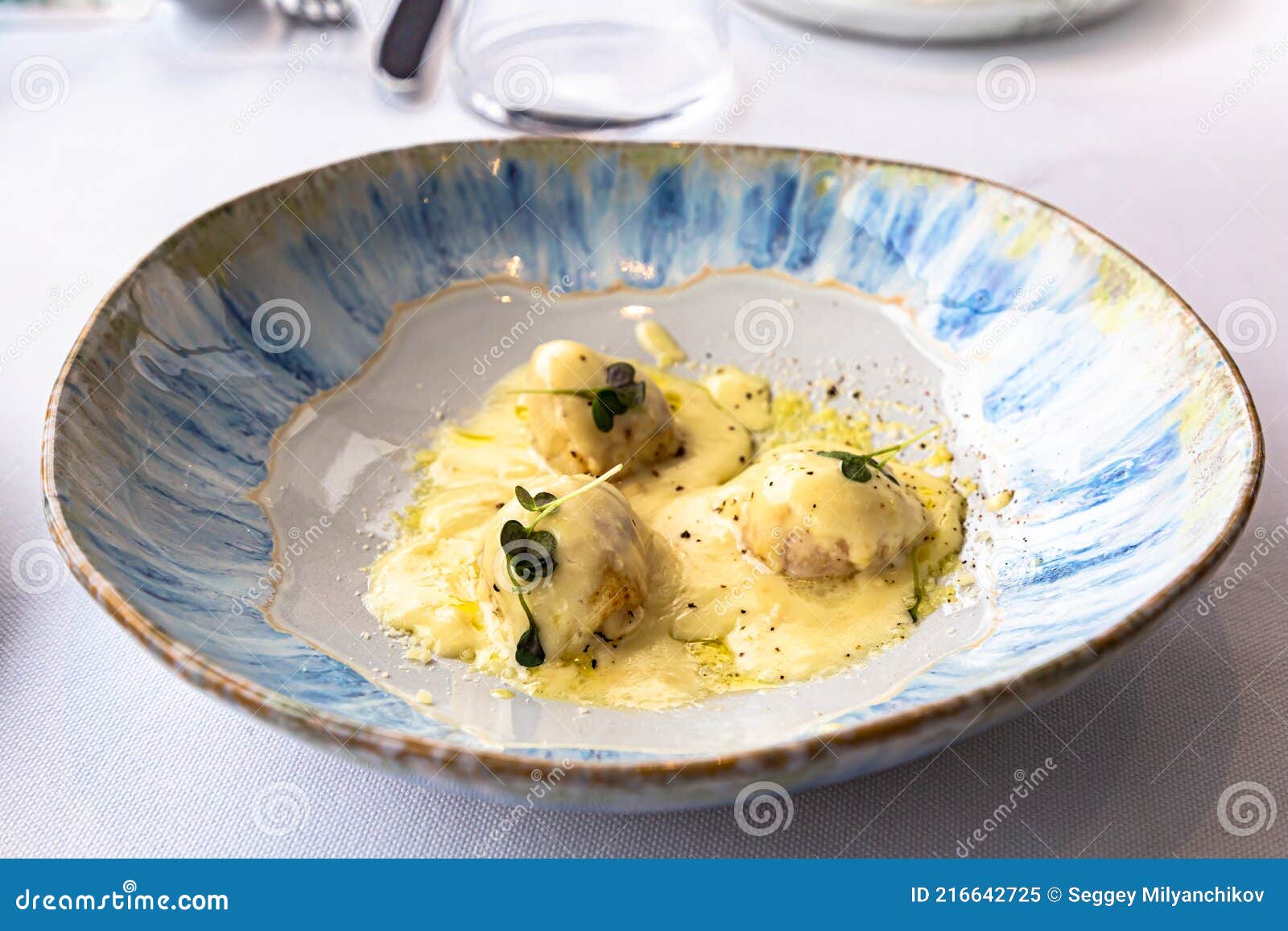 Scallops with Creamy Parmesan Sauce are on a Plate Stock Image Image