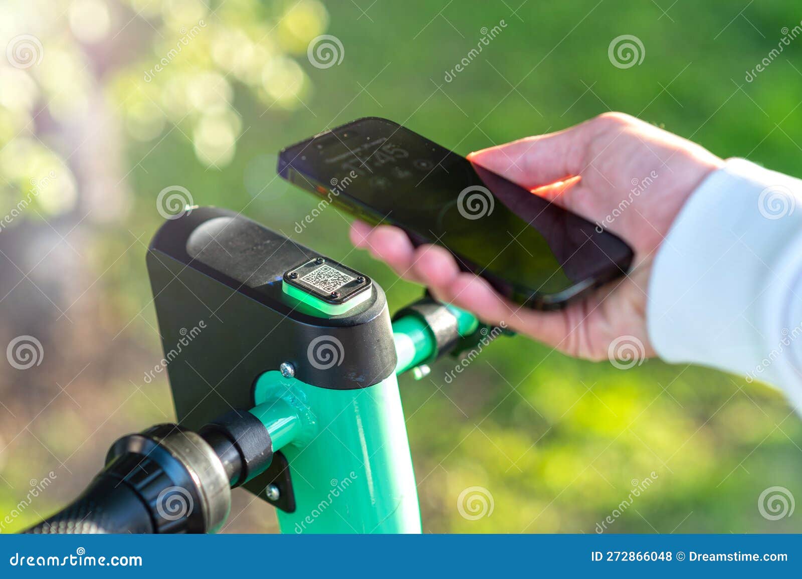 Scanning Electric Scooter QRcode by Phone. Stock Photo Image of