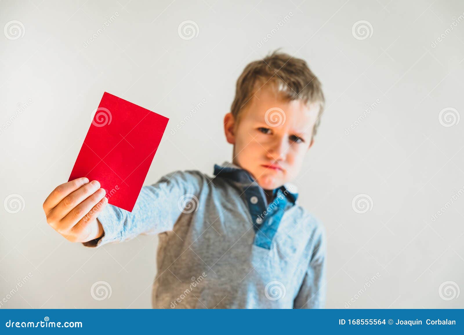 Scared Child With Red Anti Bullying Card Stock Photo
