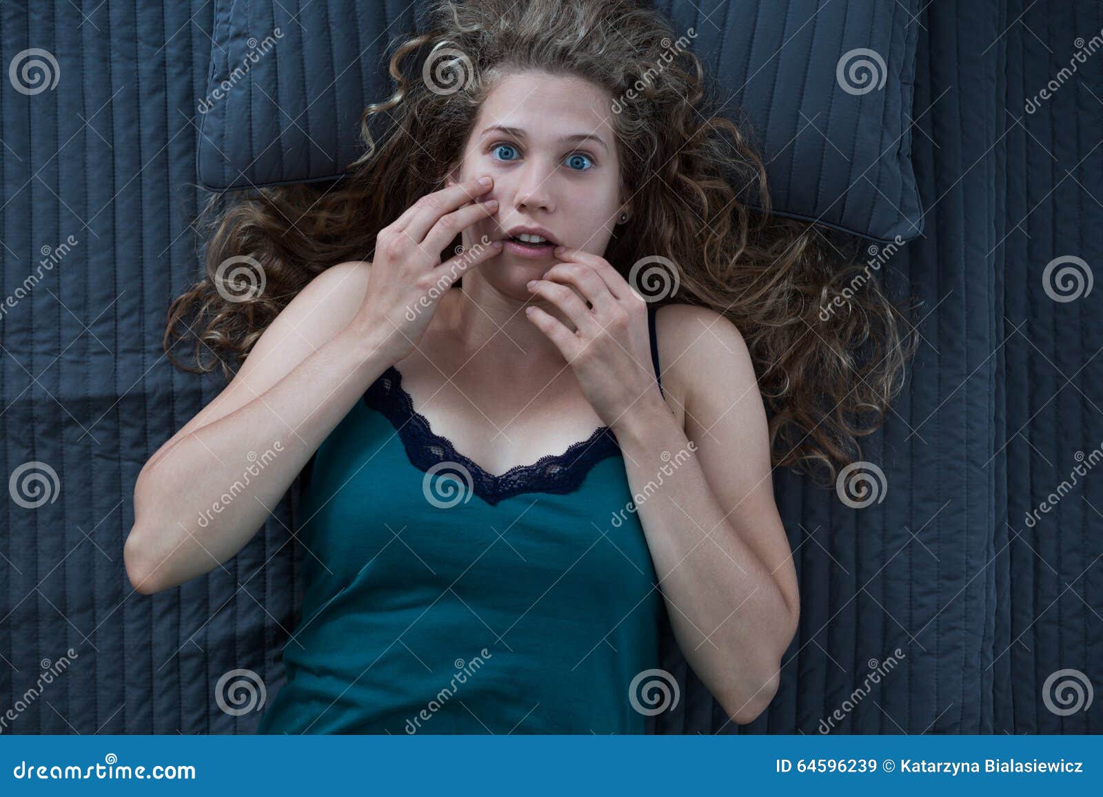 scared woman having nightmare