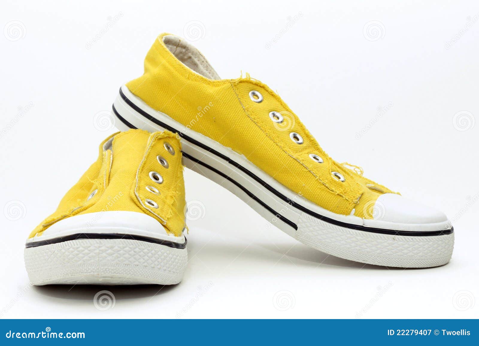 Scarpe da tennis gialle immagine stock. Immagine di yellow - 22279407