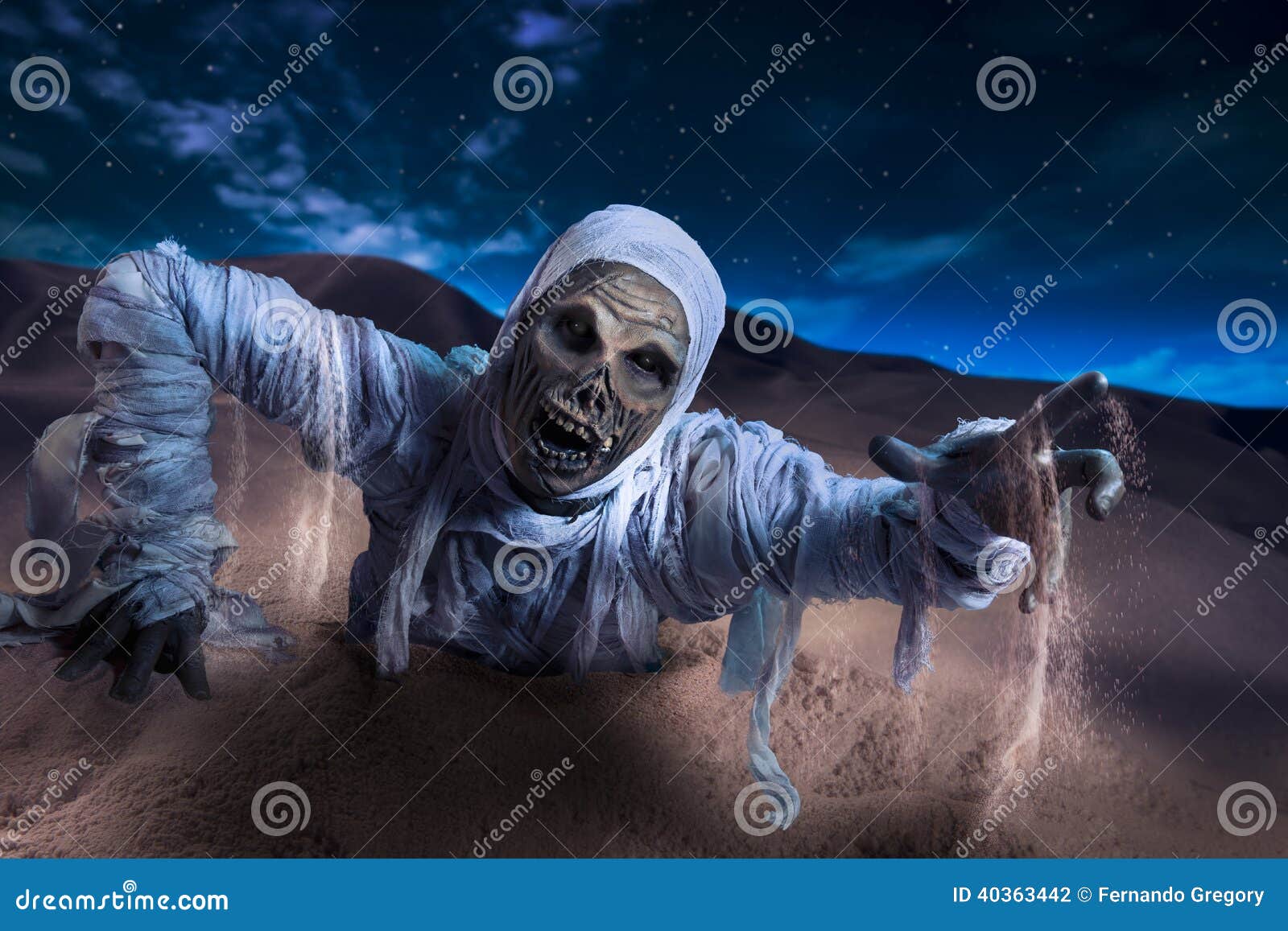 scary mummy in a desert at night