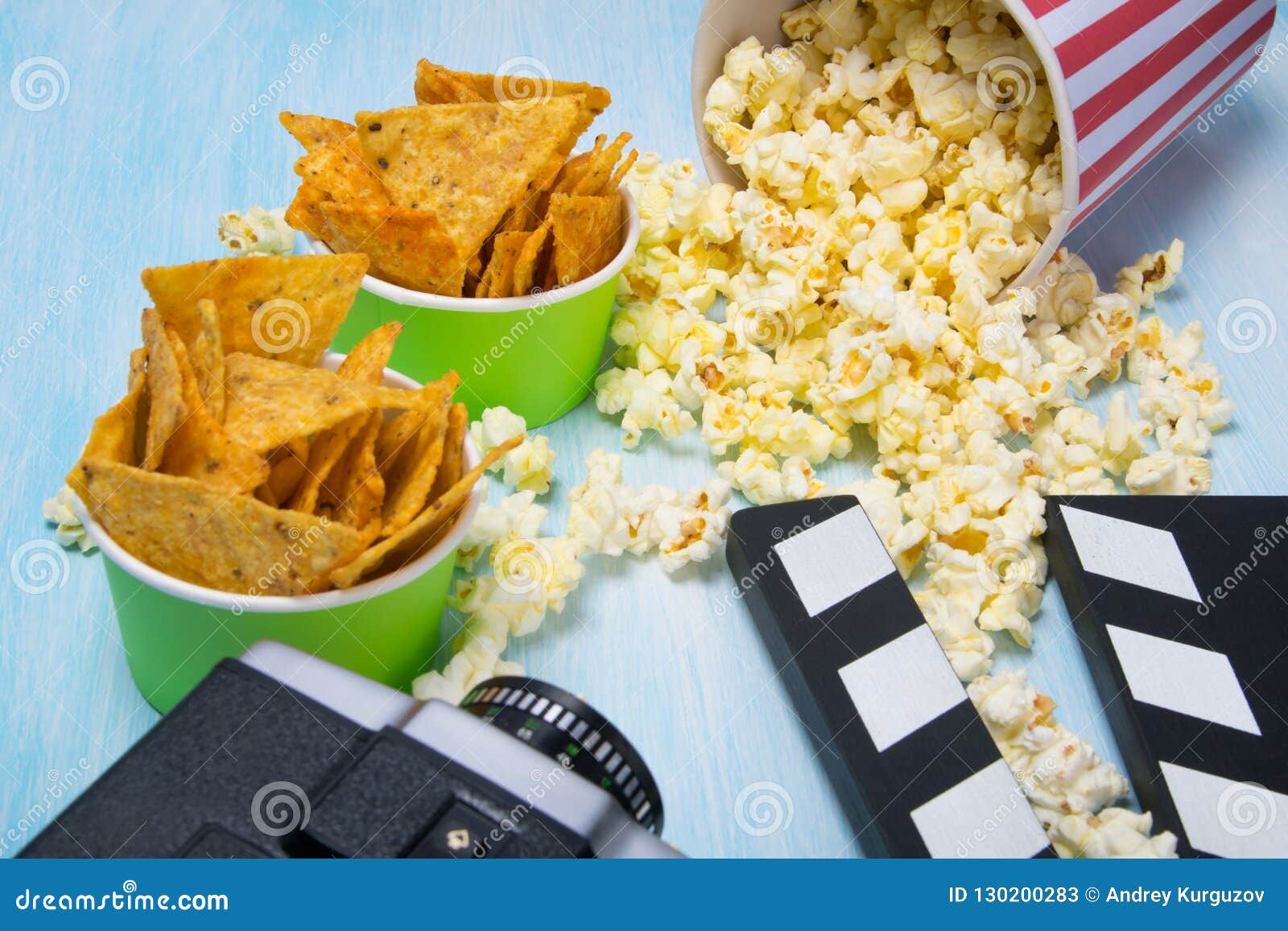 Scattered Popcorn and Two Buckets of Nachos, Next To the Video Camera