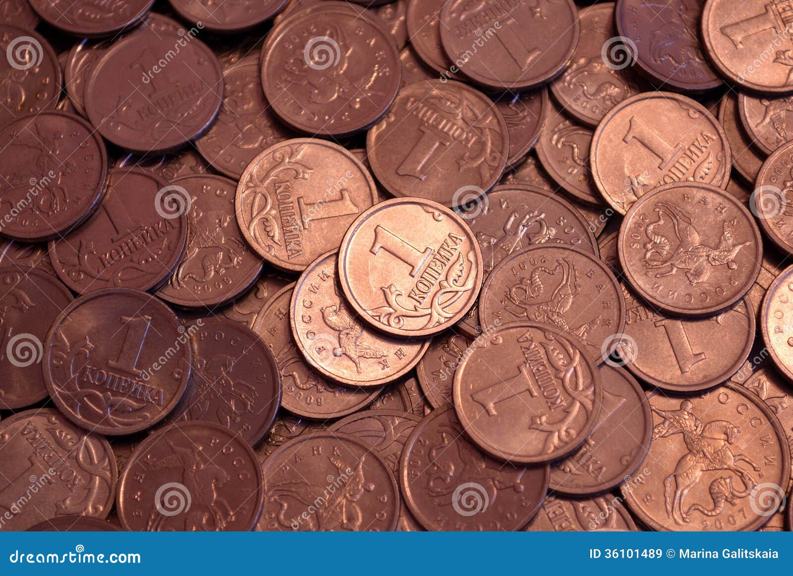 Scattering of Russian coins. A bunch of scattered yellow of the Russian coins