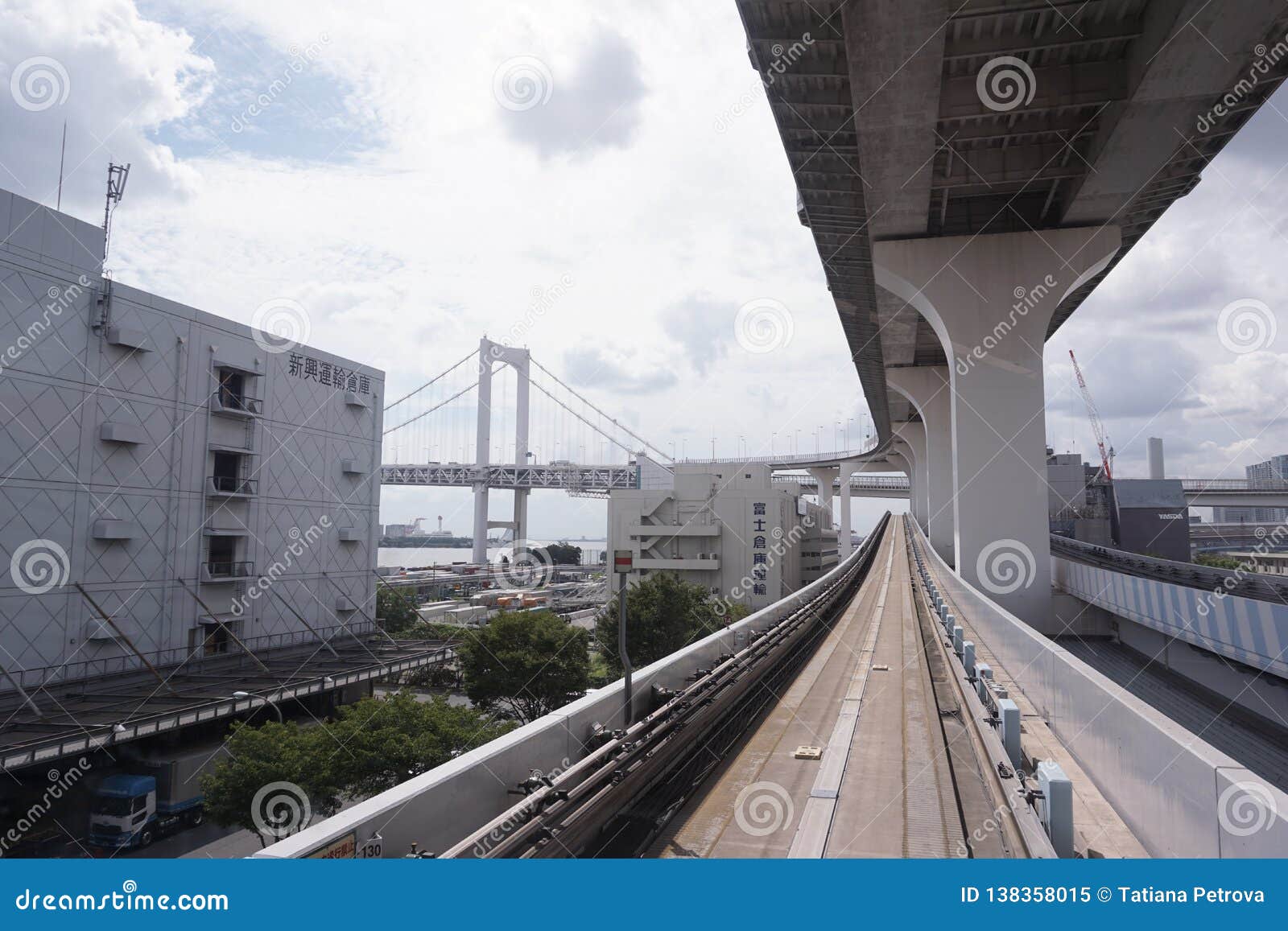 Scenery Of A Train Traveling On The Elevated Rail Of Yurikamome Line In Odaiba Road Under The Bridge Editorial Image Image Of Bridge Odaiba