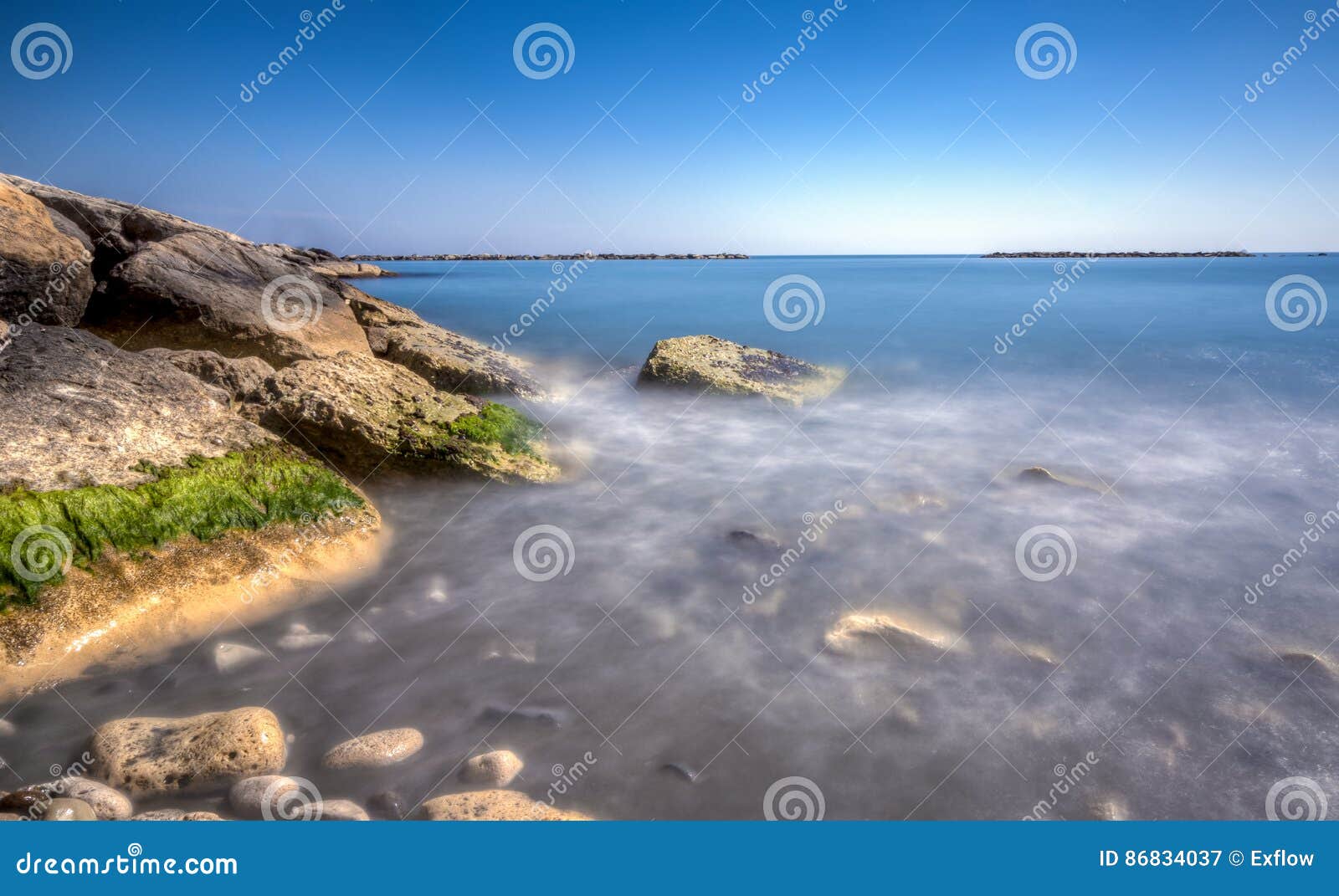 scenic blue beach with clear sea waters at germasogia, limassol