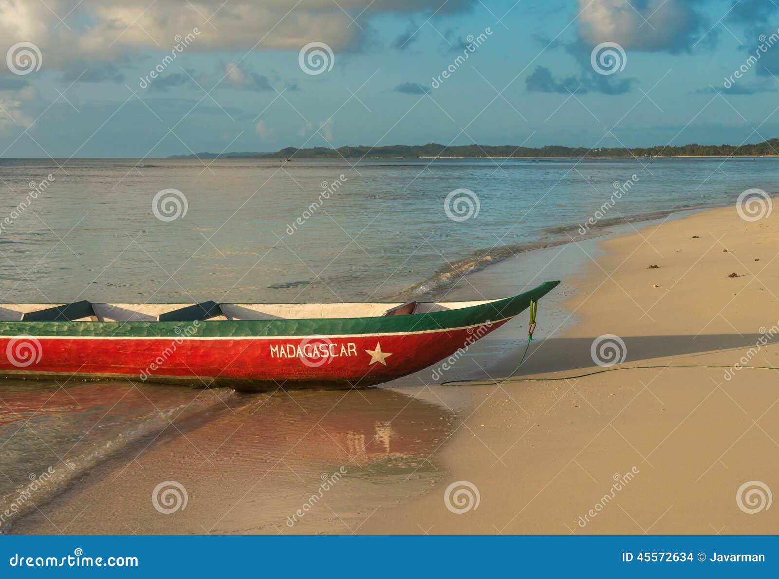 scenic boat on a sandy beach, madagascar holiday