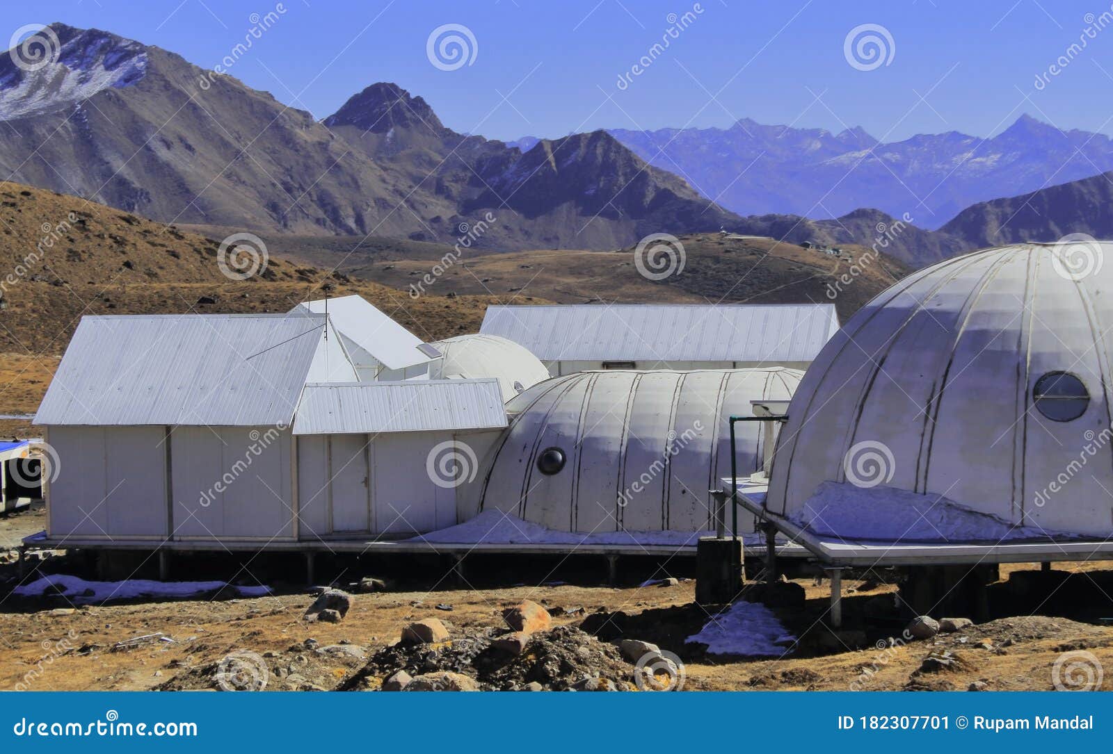 scenic high altitude alpine tibetan landscape and an observatory near bum la pass
