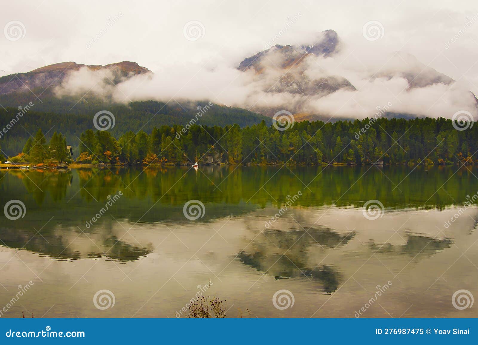 scenic landscape of low clouds of autumn and piz da la margna and lake of segl silsersee swiss