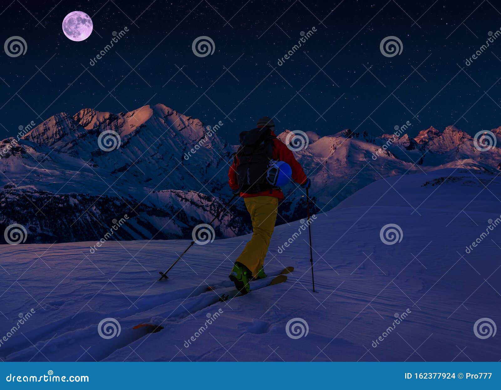 scenic night backcountry ski panorama sunset landscape of crans-montana range in swiss alps mountains with peak in background,