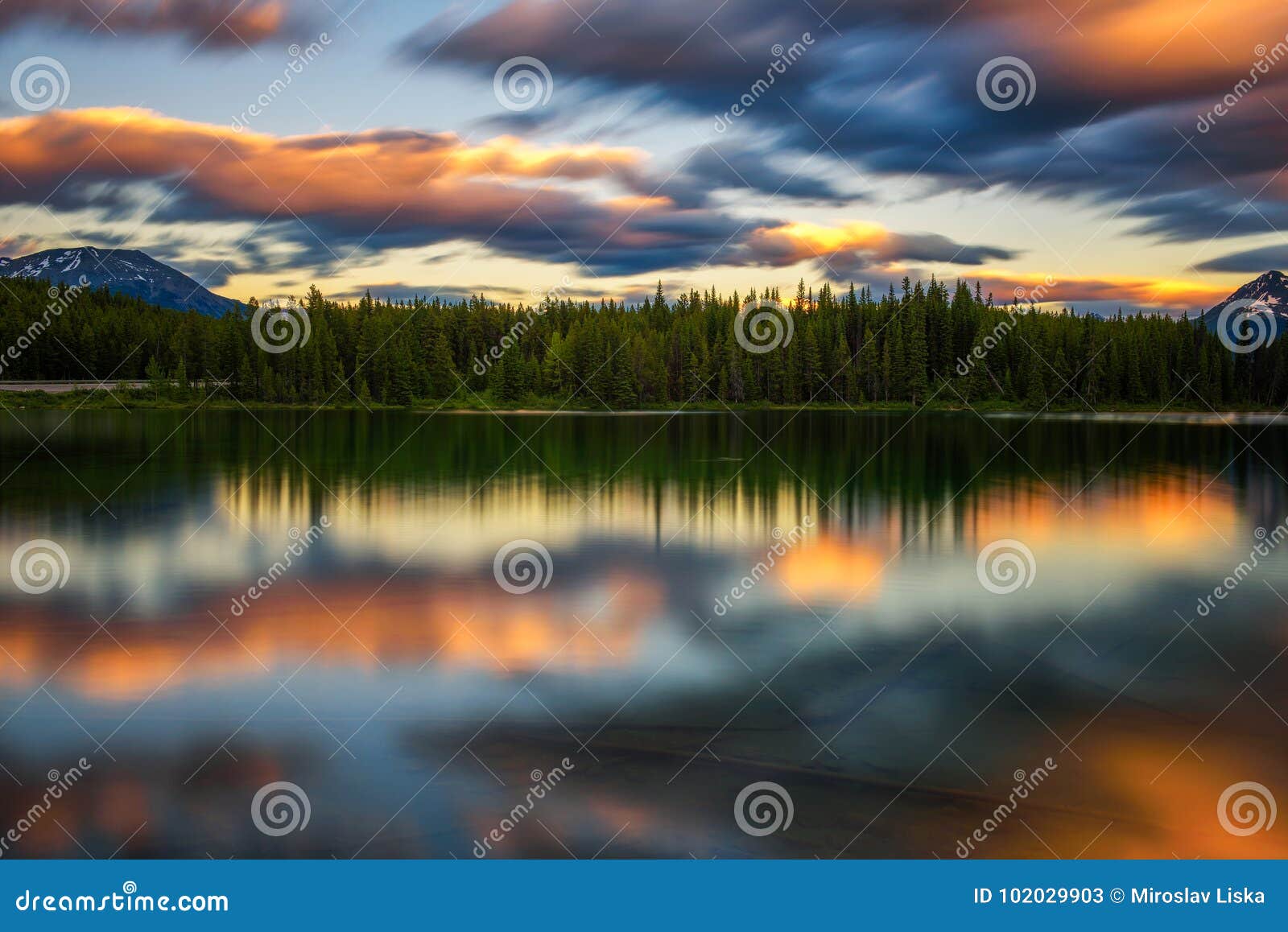 sunset over herbert lake in banff national park, alberta, canada