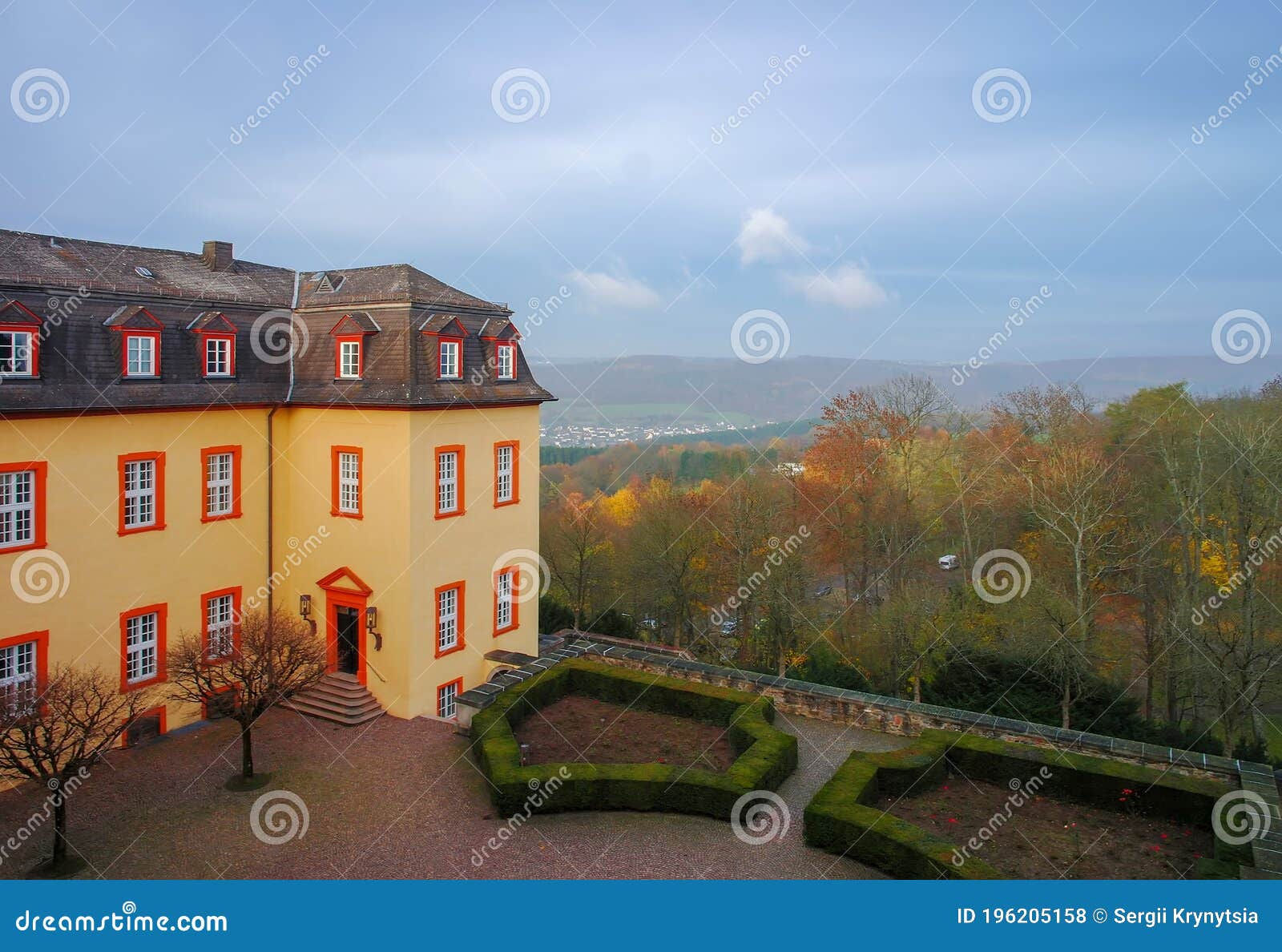 scenic view of castle of hachenburg and autumn hills of westerwald, rheinland-pfalz, germany