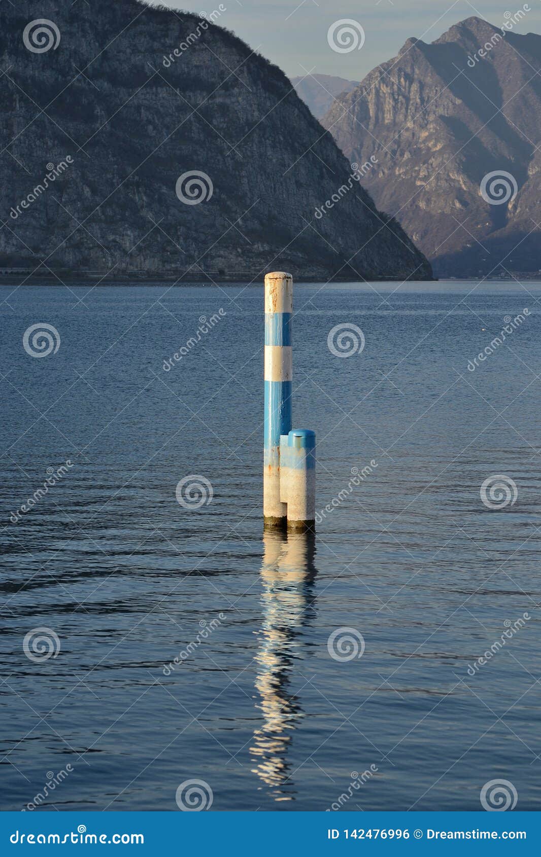 scenic view of iseo lake on a sunny winter day
