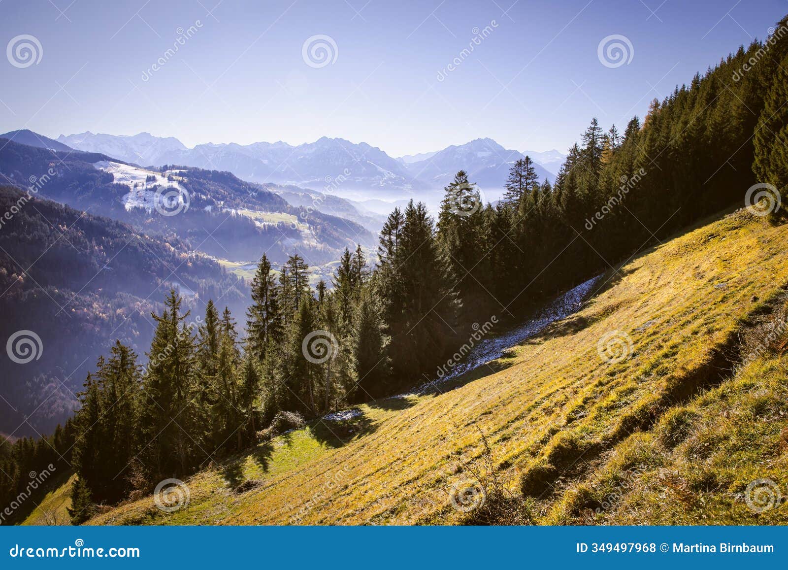 scenic view over alpine meadows and mountins at theend of november