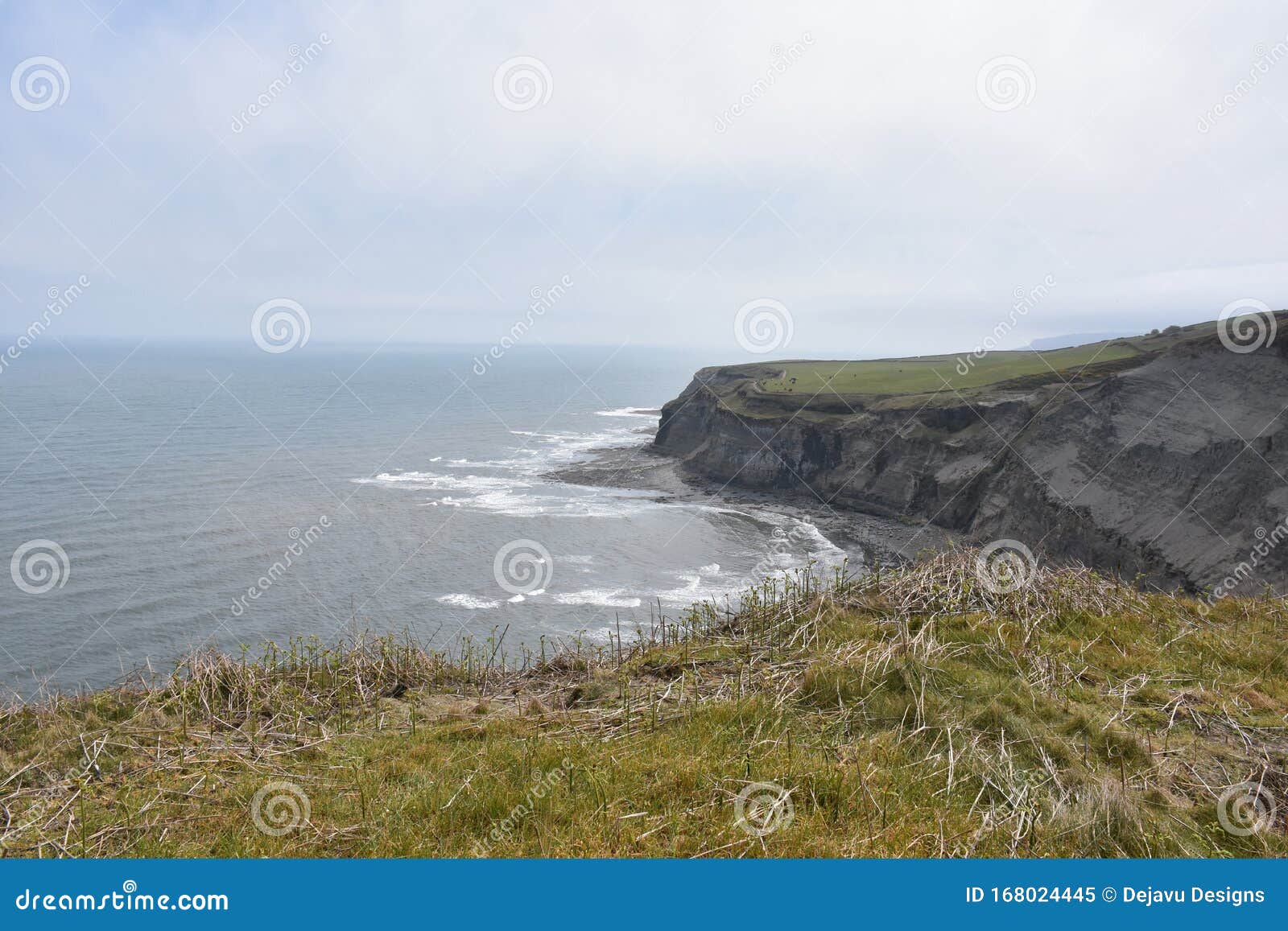 views looking down into robin hood`s bay in england