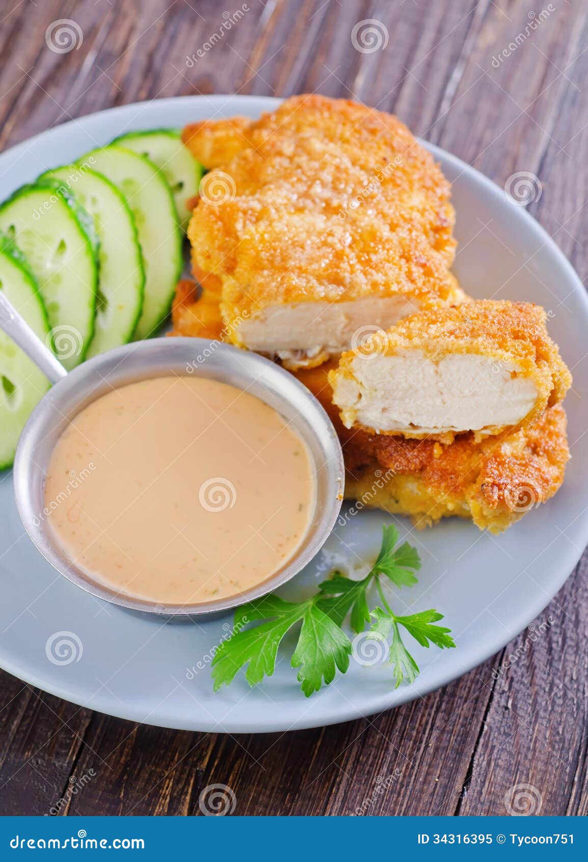 Schnitzel and sauce on plate