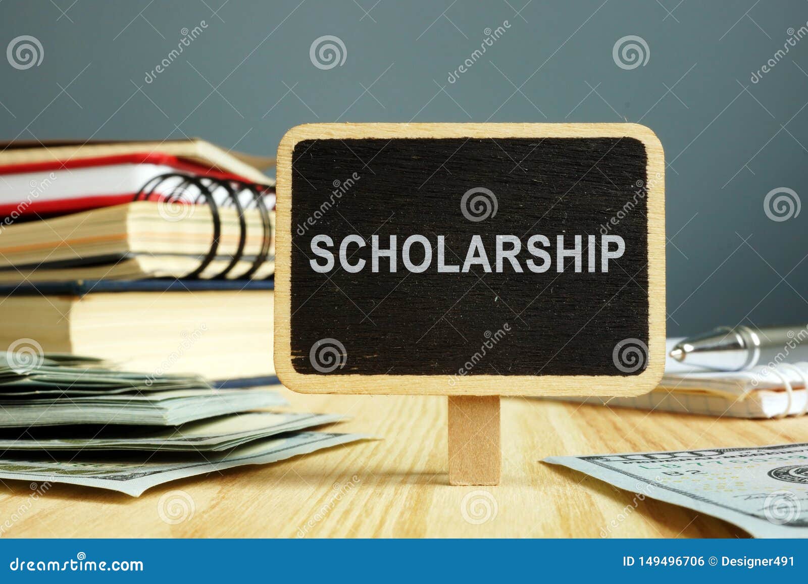 scholarship concept. notebooks and money for education