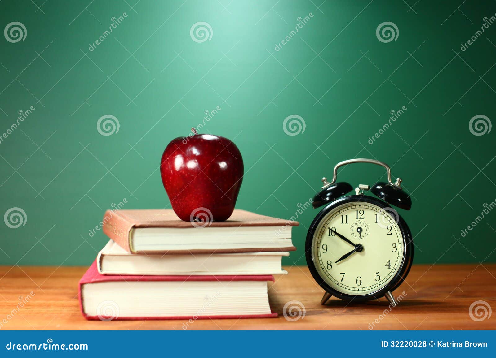 School Books, Apple and Clock on Desk at School Stock Photo Image of
