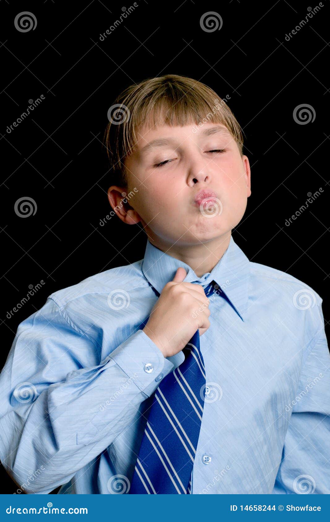 School boy adjusting tie stock photo. Image of people 14658244