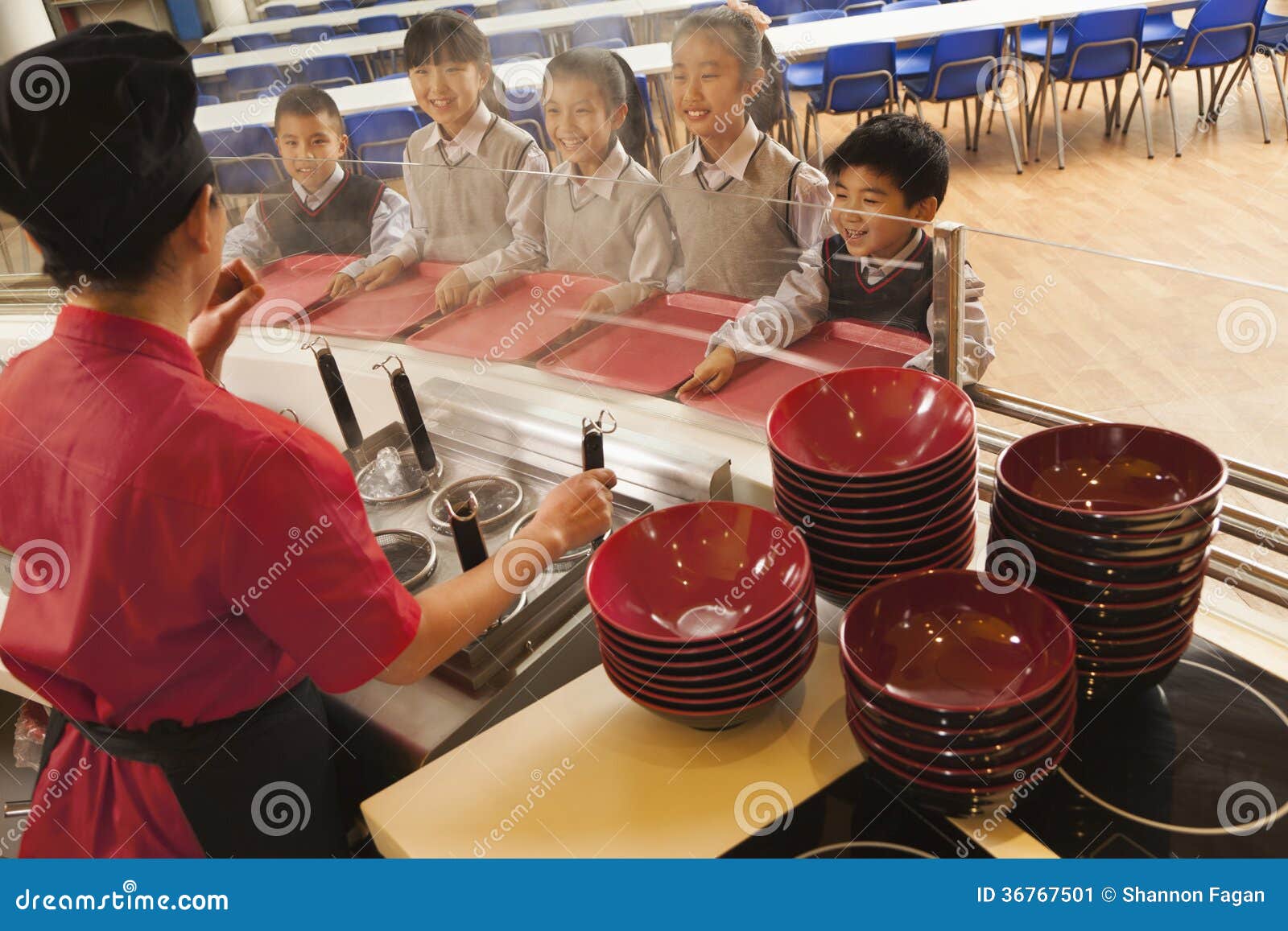 School Cafeteria Worker Serves Noodles To Students Stock Image Image school-cafeteria-worker-serves-noodles-to-students-stock-image-image