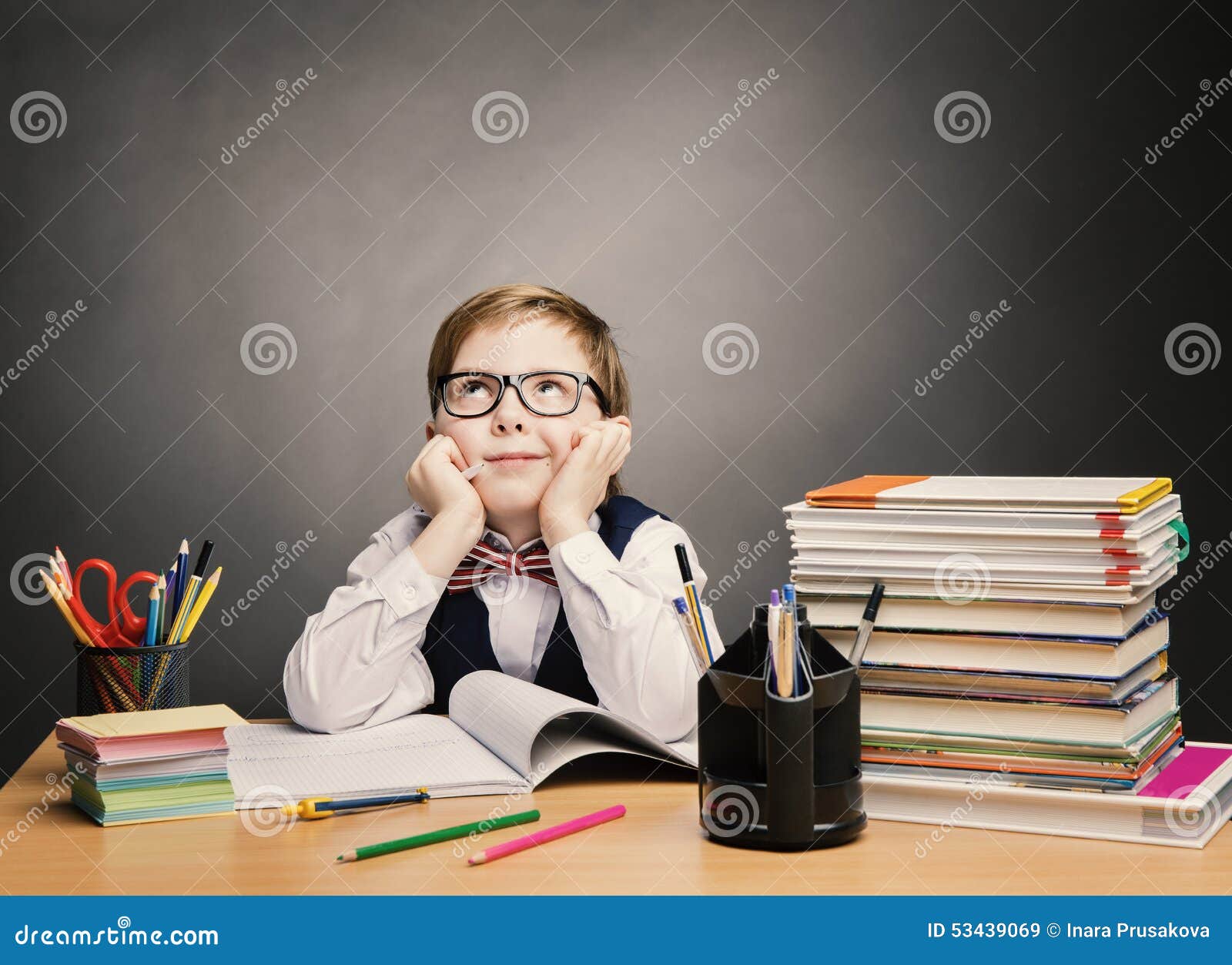 school child boy in glasses think classroom, kid students book