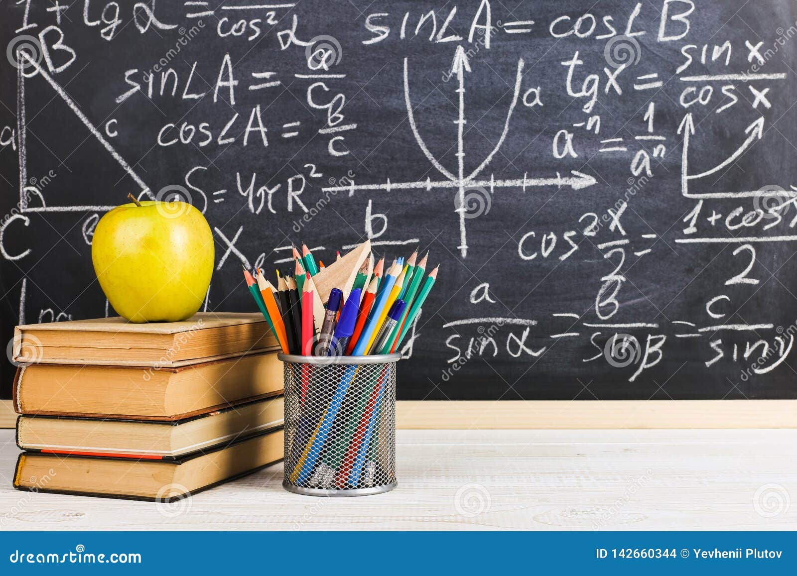 School Desk in Classroom, with Books on Background of Chalk Board with  Written Formulas. Soncept Teacher`s Day Stock Photo - Image of copy,  mathematics: 142660344