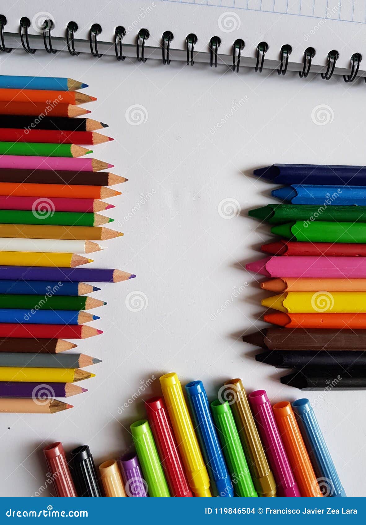 pencils crayons and markers school articles coloring next to a