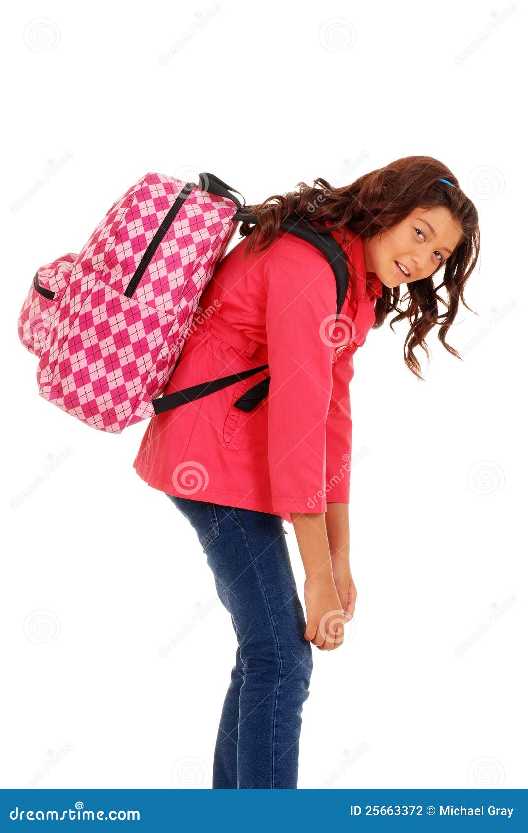 school girl with overweight backpack