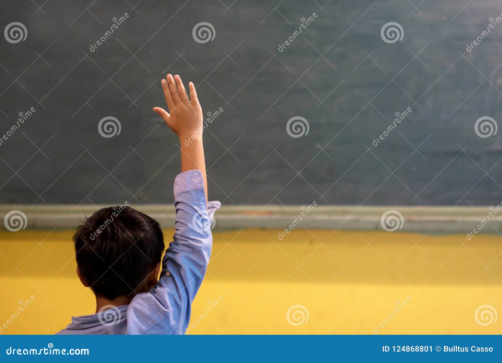 a school kid in classroom at lesson