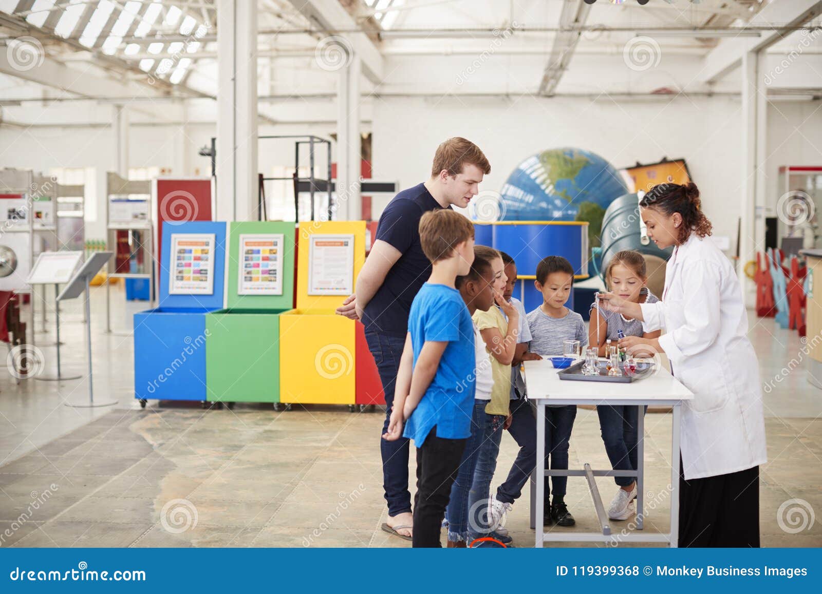 School Kids Watching a Presentation at a Science Centre Stock Photo