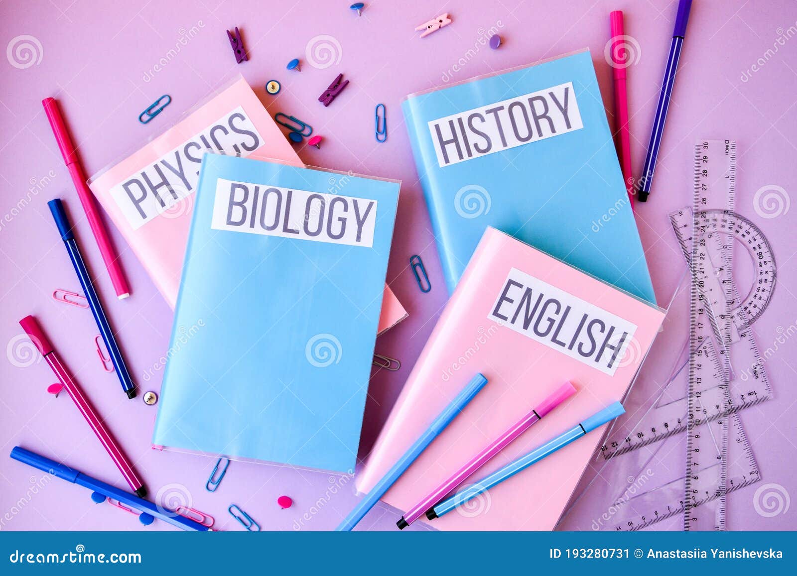 school subject books with supplies on color background, back to school. stationery ruler pencil paper clips