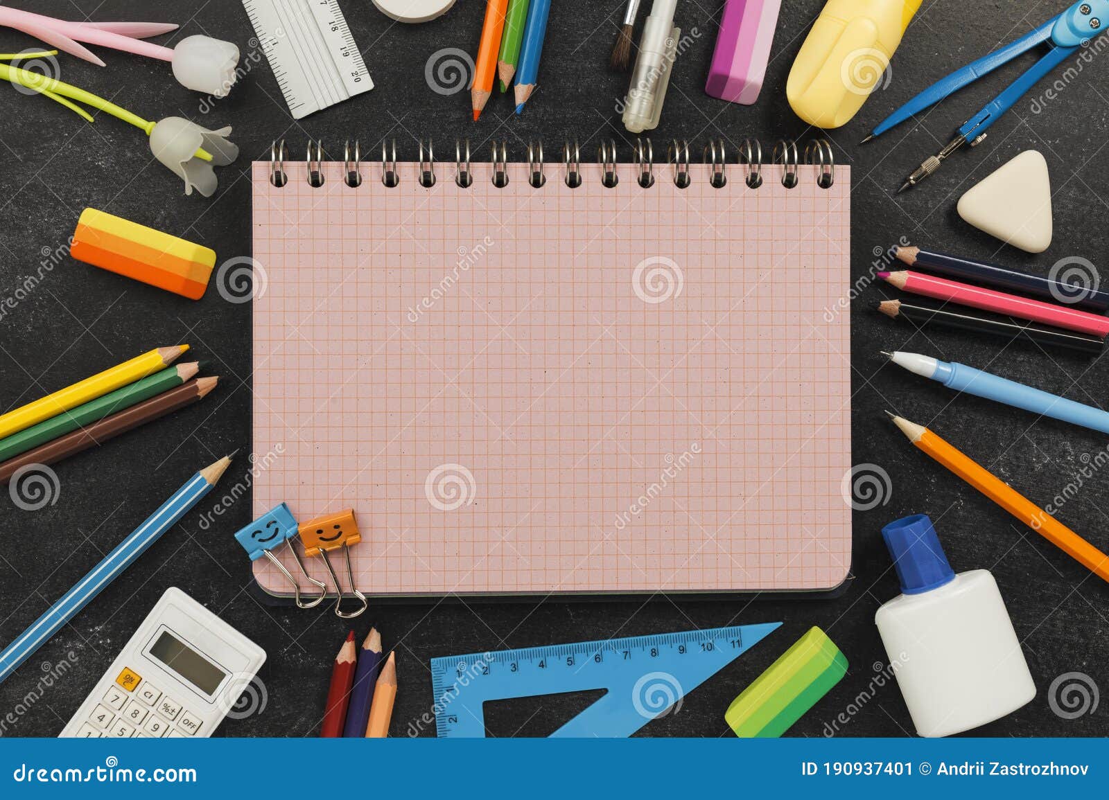 School Supply on Black Chalkboard. Copy Space for Text Stock Image