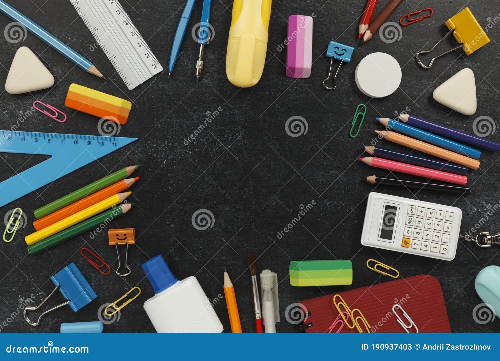 School Supply on Black Chalkboard. Copy Space for Text Stock Image