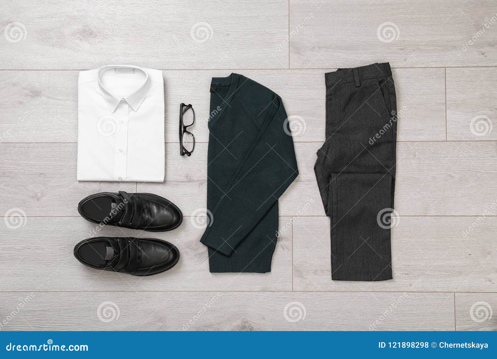 School Uniform for Boy on Laminate Stock Photo - Image of dressing ...