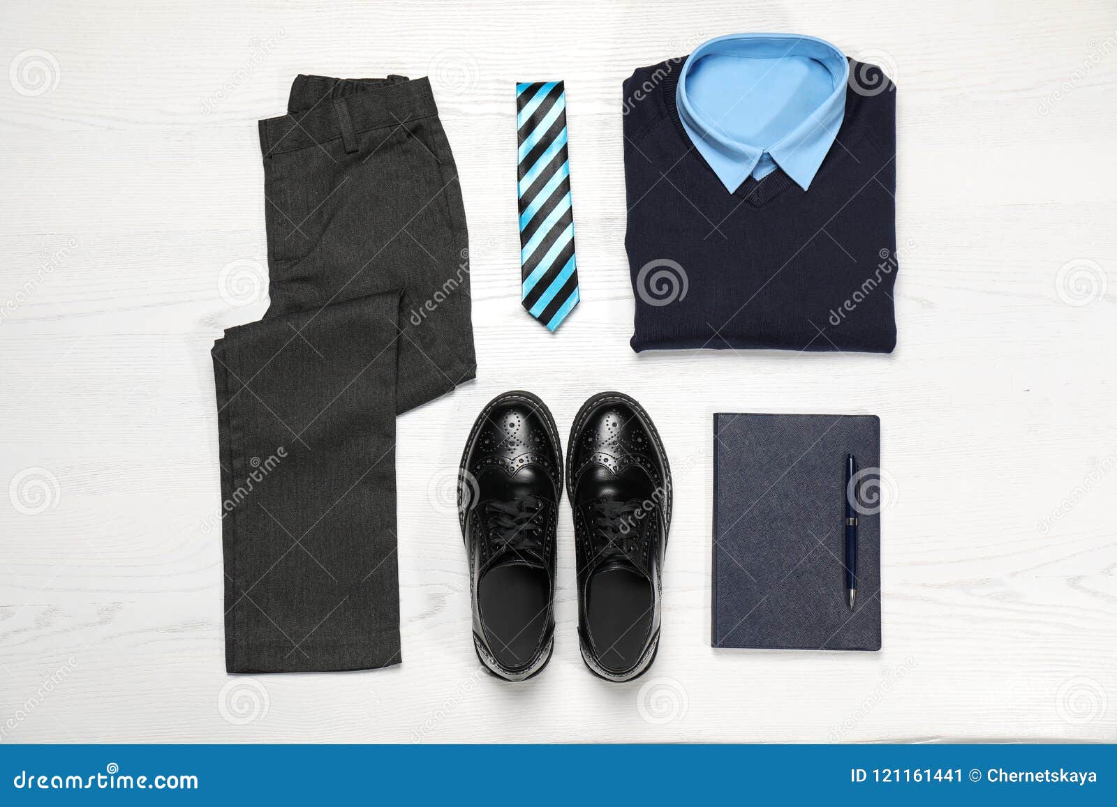 School Uniform for Boy on White Wooden Background Stock Image - Image ...