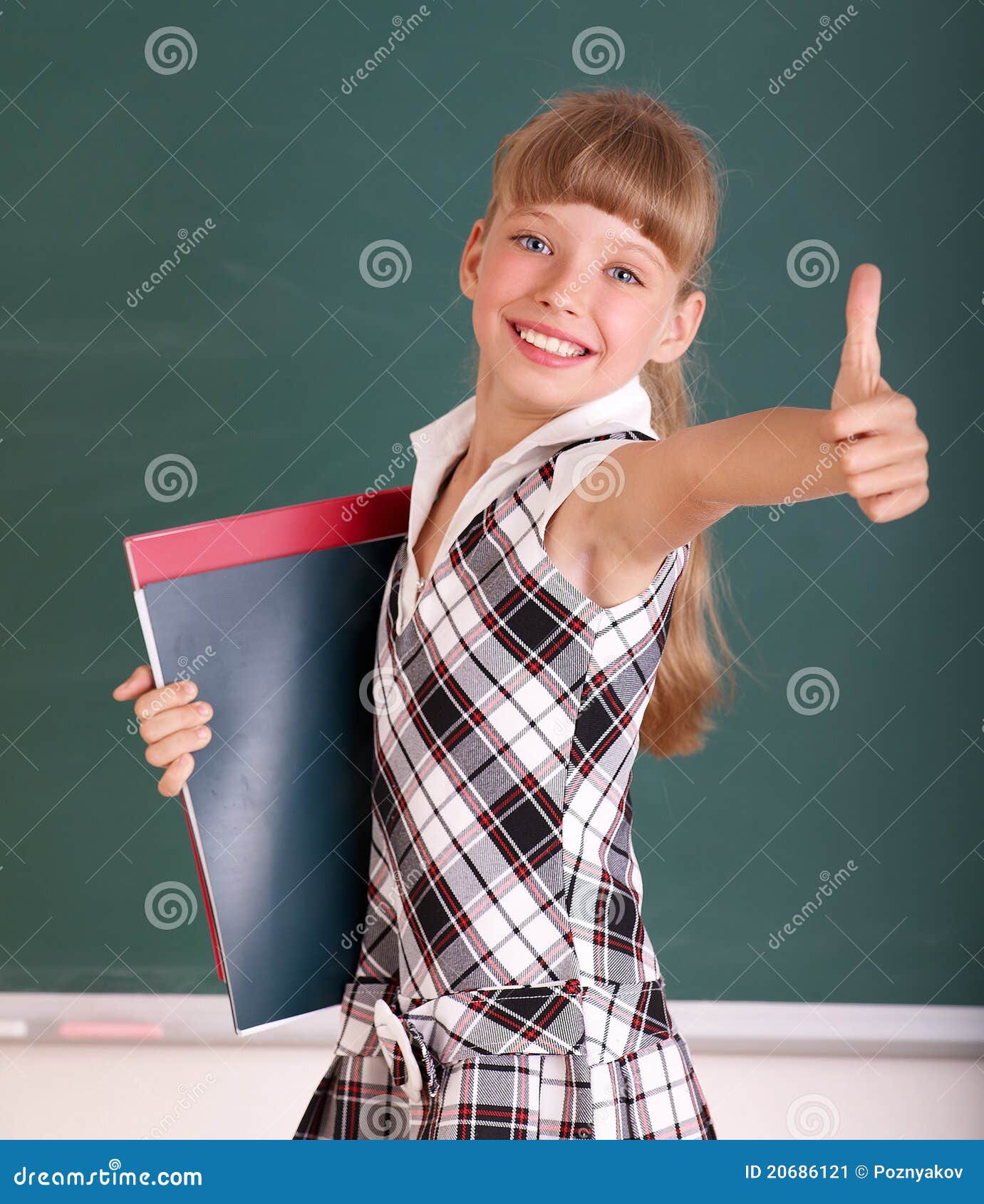 schoolchild near blackboard.