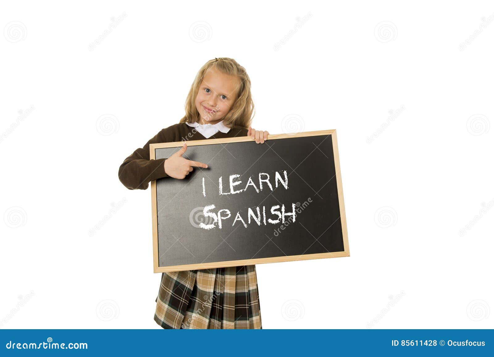 Schoolgirl Smiling Happy And Cheerful Holding And Showing Small Blackboard With Text I Learn 
